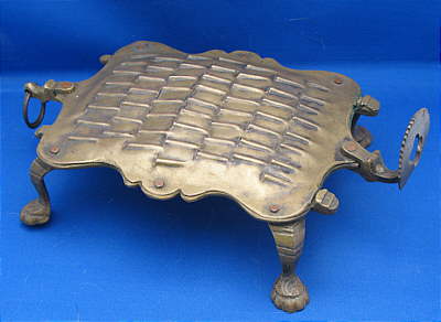 Metalware<br>Archives<br>Anthropomorphic Brass Grater