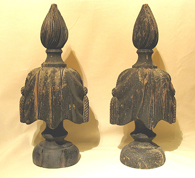 SOLD   A Spectacular Pair of Flame-top Carved Urns