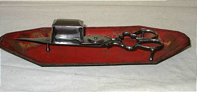 A Tole Tray with Cut Steel Wick Cutter or Snuffer