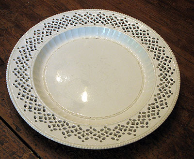 Ceramics<br>Ceramics Archives<br>SOLD  A Large Creamware Pireced Plate