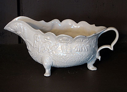 Ceramics<br>Ceramics Archives<br>SOLD  An 18th century footed saltglaze sauceboat