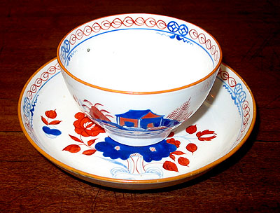 SOLD  A Lowestoft Soft Paste tea bowl and saucer.