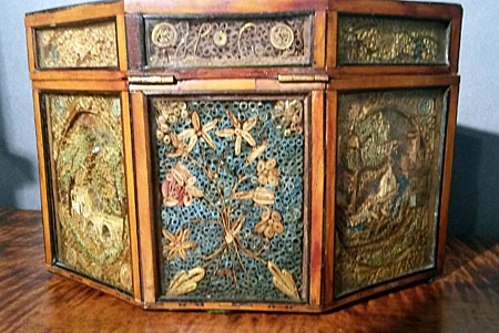 An amazing 18th century paper filigree tea caddy.