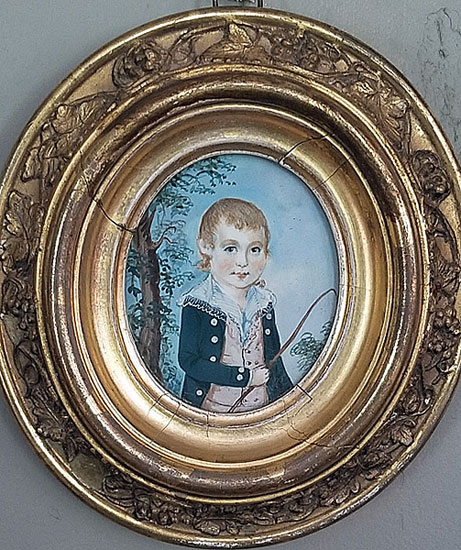 Portrait of a boy with his whip