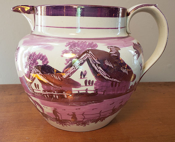 Ceramics<br>19th Century<br>Pink Lustre Cottage Jug with a Surprise