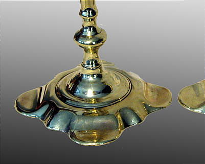 A Pair of Queen Anne Brass Candlesticks