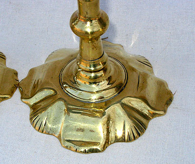 A Pair of Queen Anne Brass Candlesticks