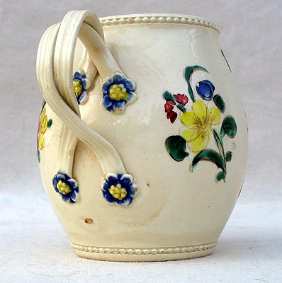 A Rare Creamware Mask Jug