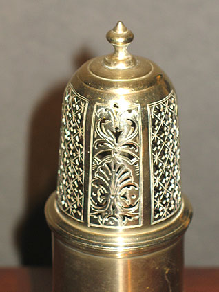 SOLD  18th century brass caster.