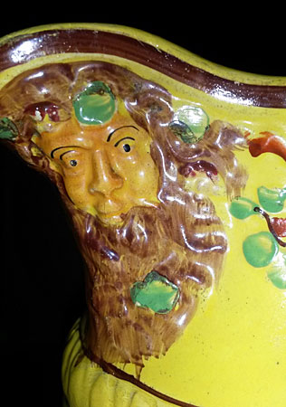 Ceramics<br>Ceramics Archives<br>SOLD Yellow-glazed jug with masks