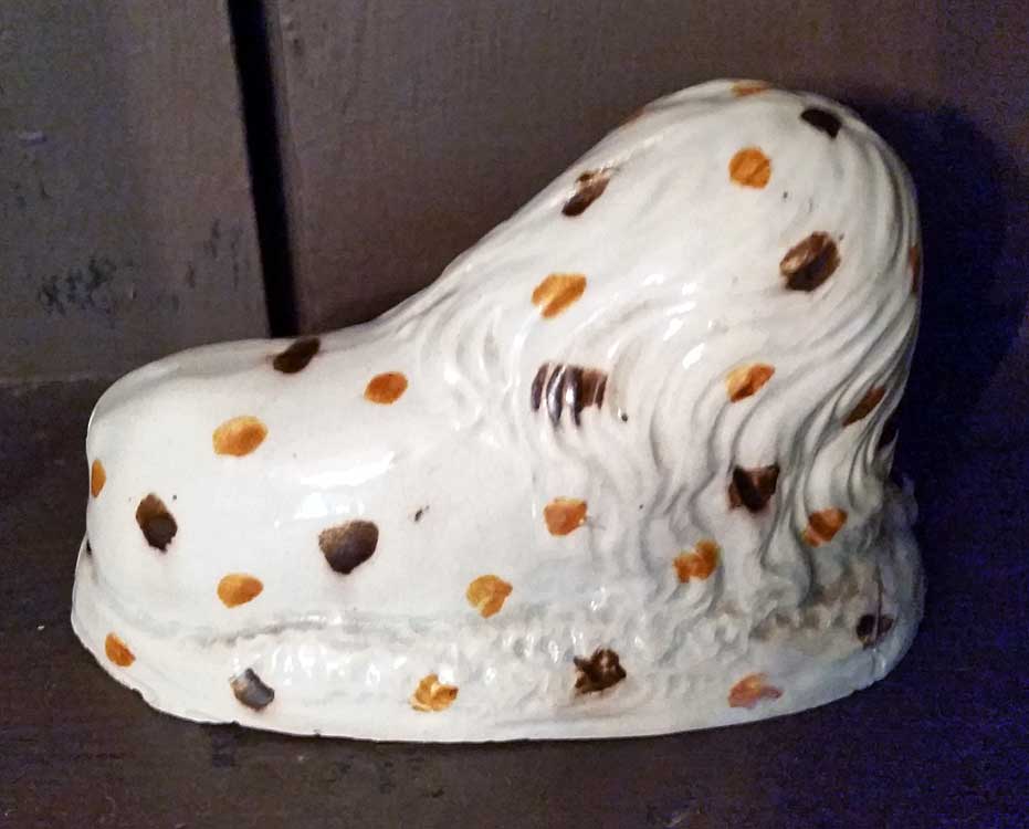 Creamware lion with spots