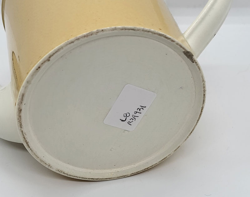 Ceramics<br>19th Century<br>Creamware teapot with slip decoration