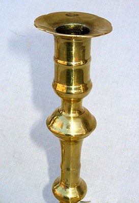 A Pair of Queen Anne Brass Candlesticks