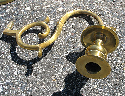 SOLD A Pair of Single-Arm Brass Sconces