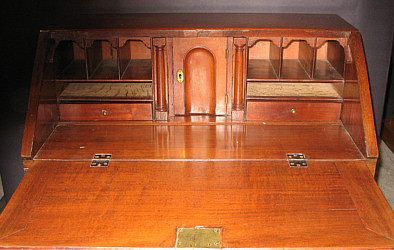 SOLD  A SCARCE 30” CHIPPENDALE SLANT-LID DESK IN MAHOGANY