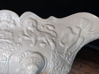 SOLD  An 18th century footed saltglaze sauceboat