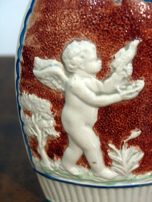 SOLD  A Four Seasons Pearlware Flask