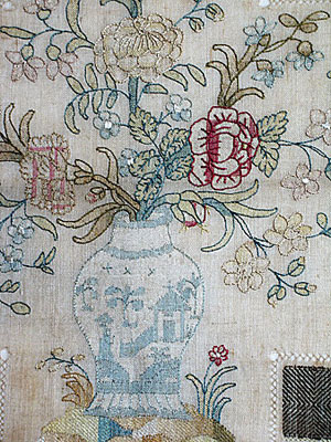 SOLD An unusual Chinoiserie Darning Sampler