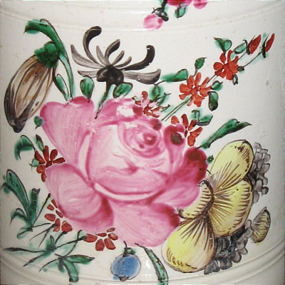 SOLD   SALTGLAZE MUG WITH FLORAL ENAMEL DECORATION