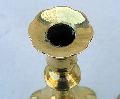 A Pair of Queen Anne Brass Candlesticks