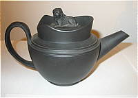 SOLD   A CHARMING BASALT ONE-CUP TEAPOT