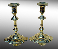 A Pair of Queen Anne Brass Candlesticks