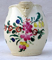 A Rare Creamware Mask Jug