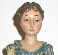 SOLD   A Carved Wood Figure of a Woman