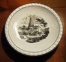 Porcelain Saucer with bottle oven transfer