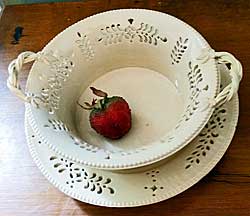 Rare small pierced creamware basket and stand