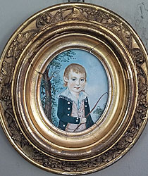 Portrait of a boy with his whip