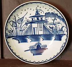 Pearlware saucer with Chinese House Decoration