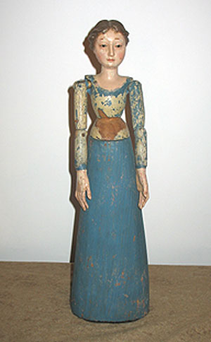 SOLD   A Carved Wood Figure of a Woman